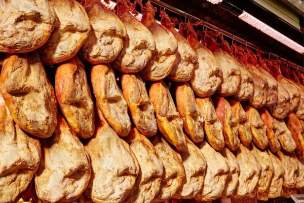 Travel to the Alpujarra in the southern Sierra Nevada. The cured ham route in Trevelez